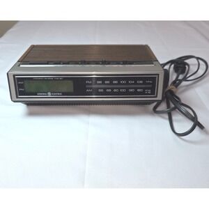General Electric Vintage AM FM Clock Radio Wood Grain Model 7-4655A MCM Retro